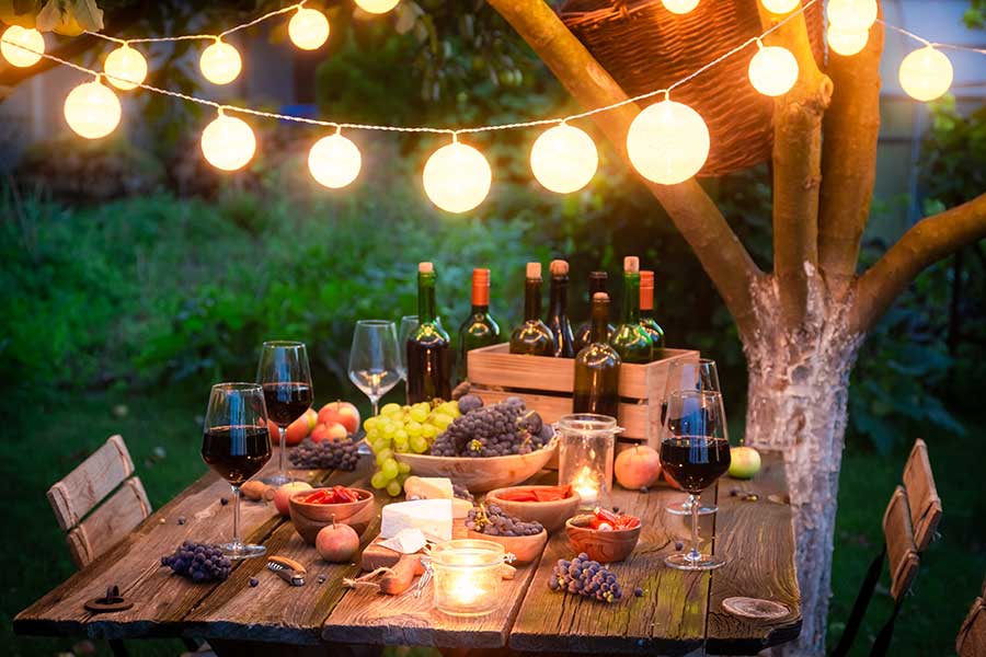 Attractive garden string lights set the mood for an evening of outdoor entertaining 